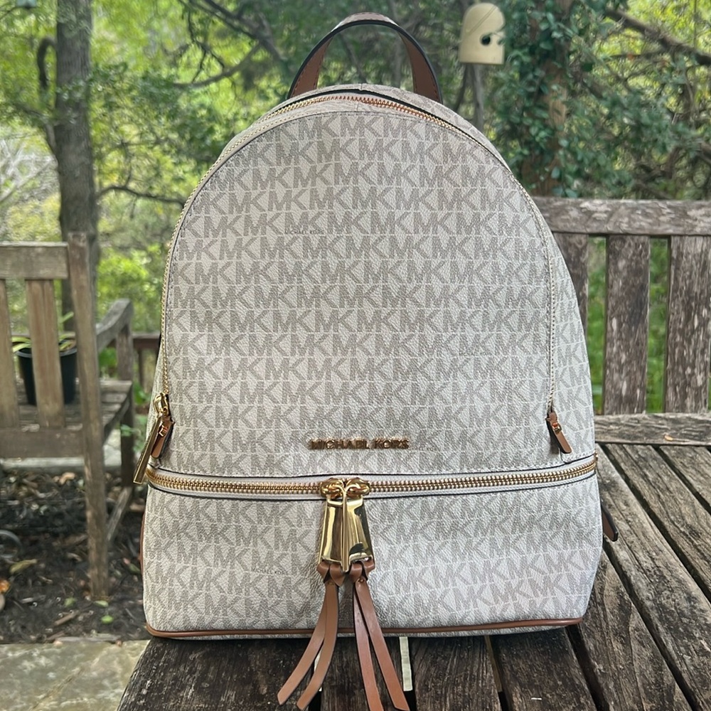 BRAND NEW!!!! Never used Michael Kors backpack with duster bag